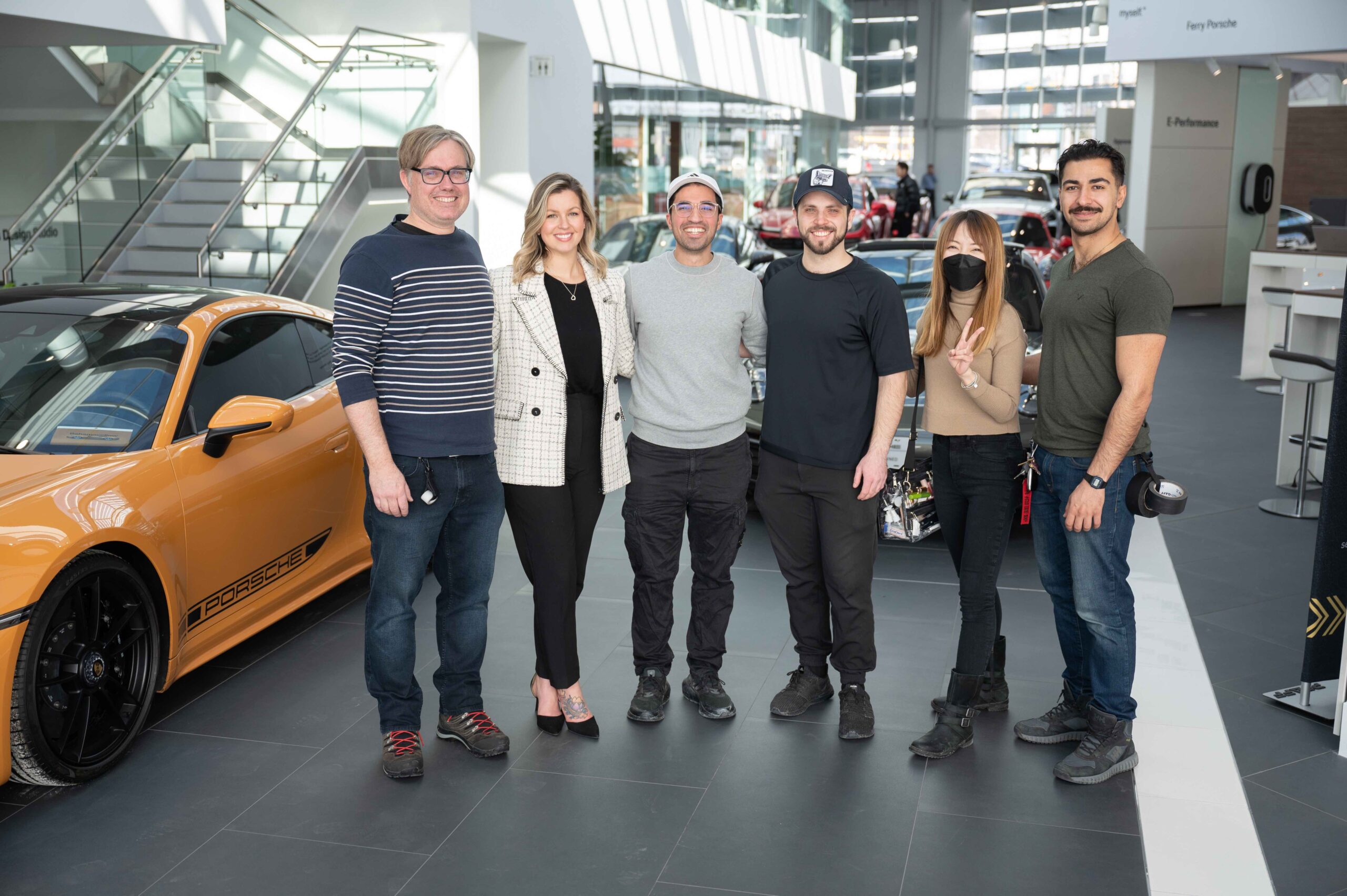 Group photo of the Lapse Productions crew on location during a video production shoot.